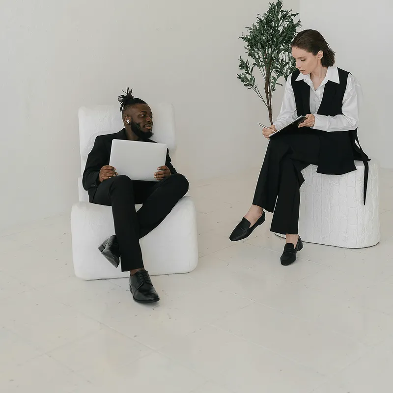 woman and man  sitting on a chair