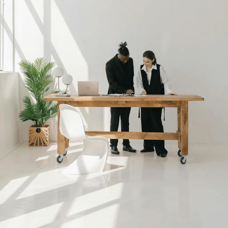 2 People behind a table